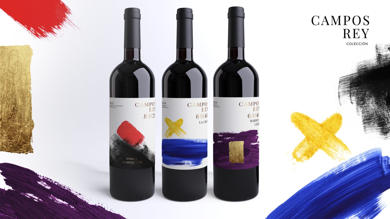El sistema aplicado a una gama: varias botellas Campos Rey con la misma estructura de etiqueta y una mancha de color distinta en cada una, en oro, azul y morado.